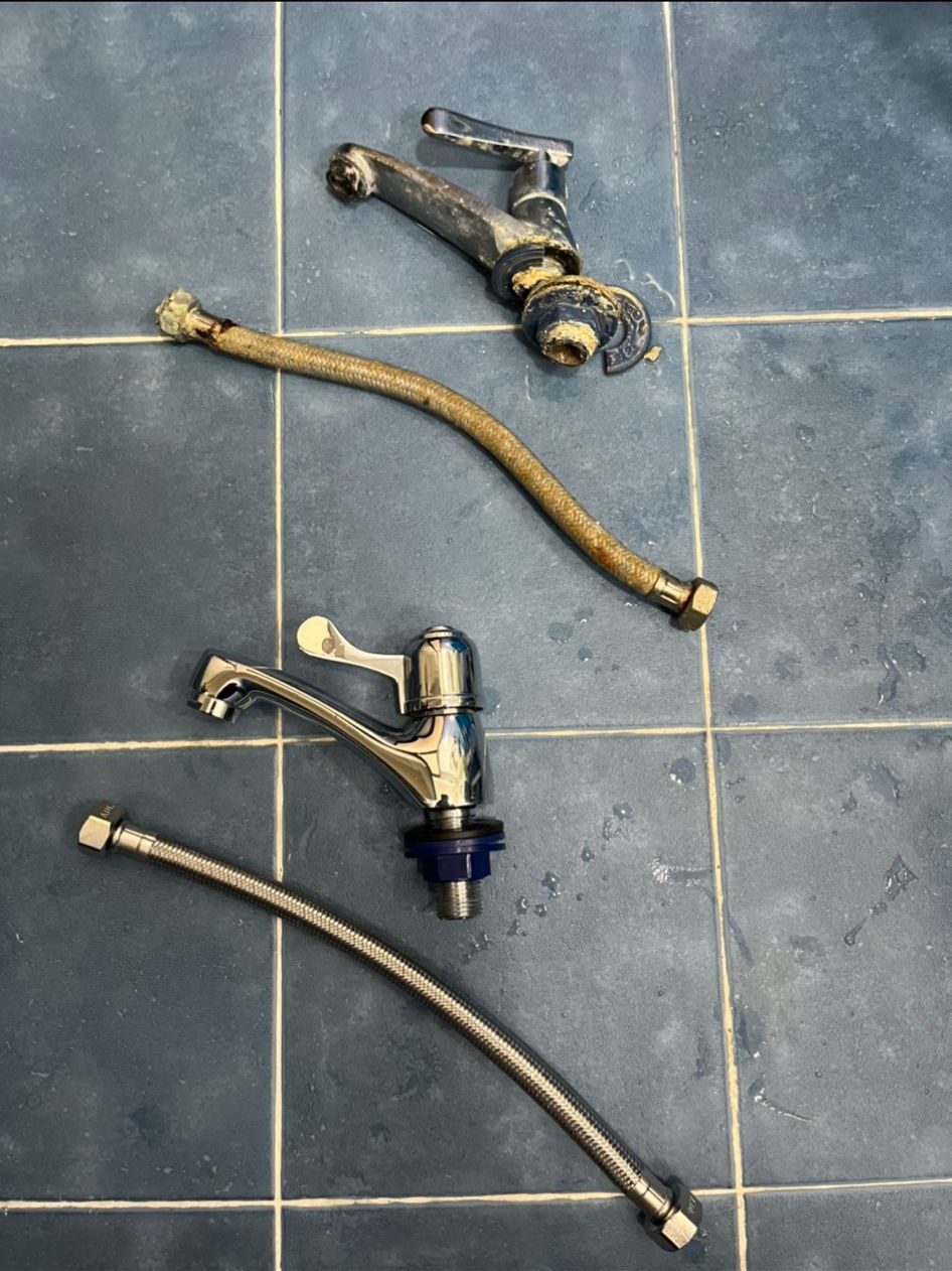 A corroded old tap and hose beside the new chrome tap and braided hose that replaced them